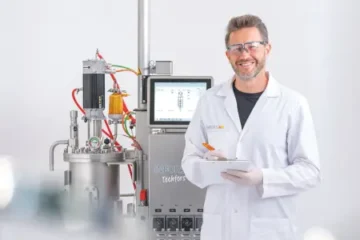 Infors Techfors S bioreactor with person